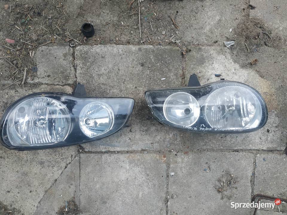 Toyota Corolla 2000 2001 lampa prawa lewa Byków