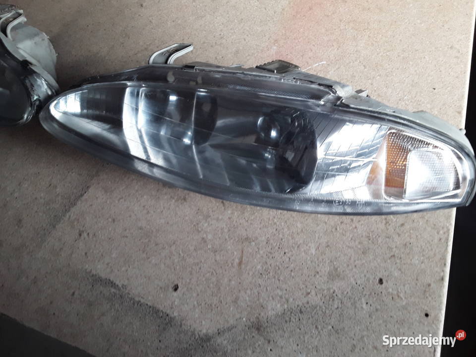 LAMPA PRAWA lewa REFLEKTOR MITSUBISHI ECLIPSE Warszawa