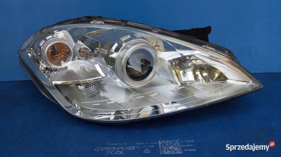 LAMPA PRAWY PRZÓD EU XENON MERCEDES A KLASA W169 Lampy przednie Nowy Tomyśl