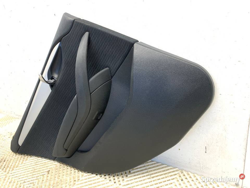 BOCZEK DRZWI LEWY TYŁ BMW E84 SUV 0915 TAPICERKA