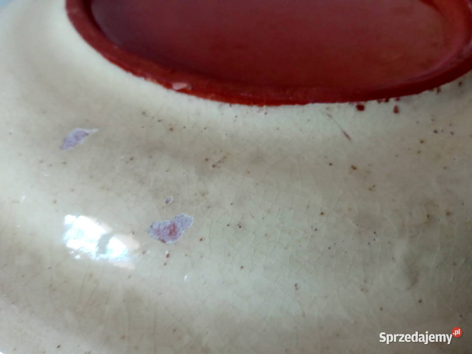 Stary zdobiony ceramiczny talerz wiszący