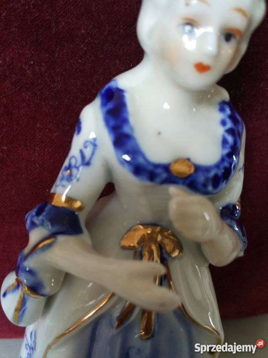 Figurka z porcelanydama z brawami Ropa