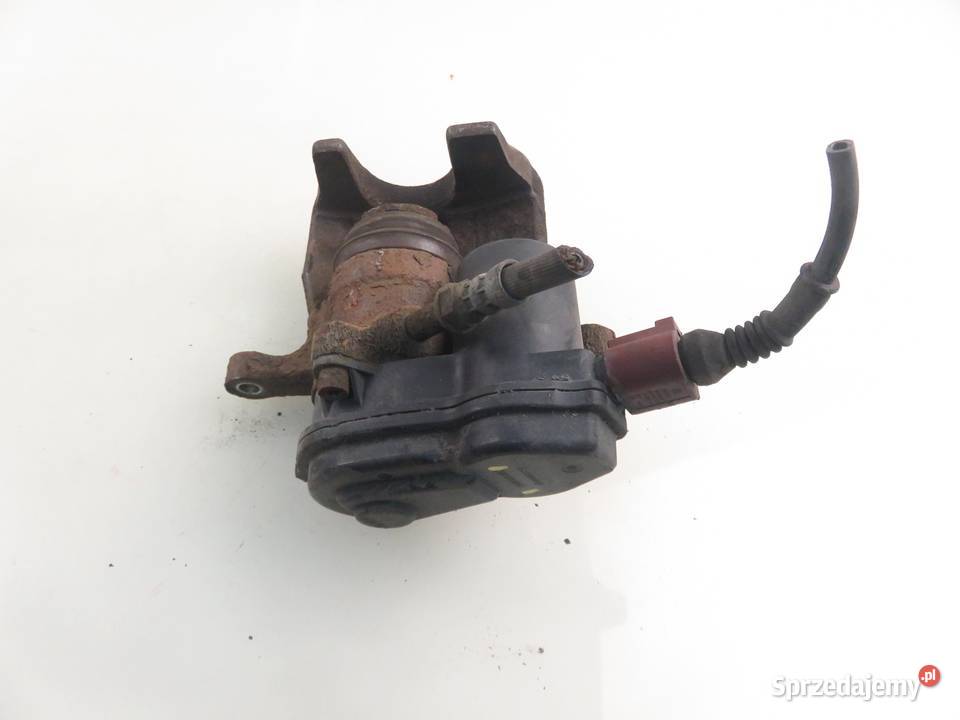 ZACISK LEWY TYŁ AUDI A4 B8 18 TFSI 32335478 sprzedam