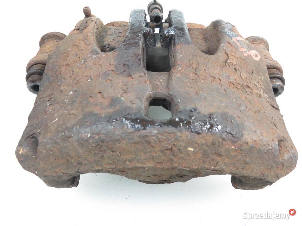 ZACISK LEWY PRZÓD NISSAN CABSTAR małopolskie