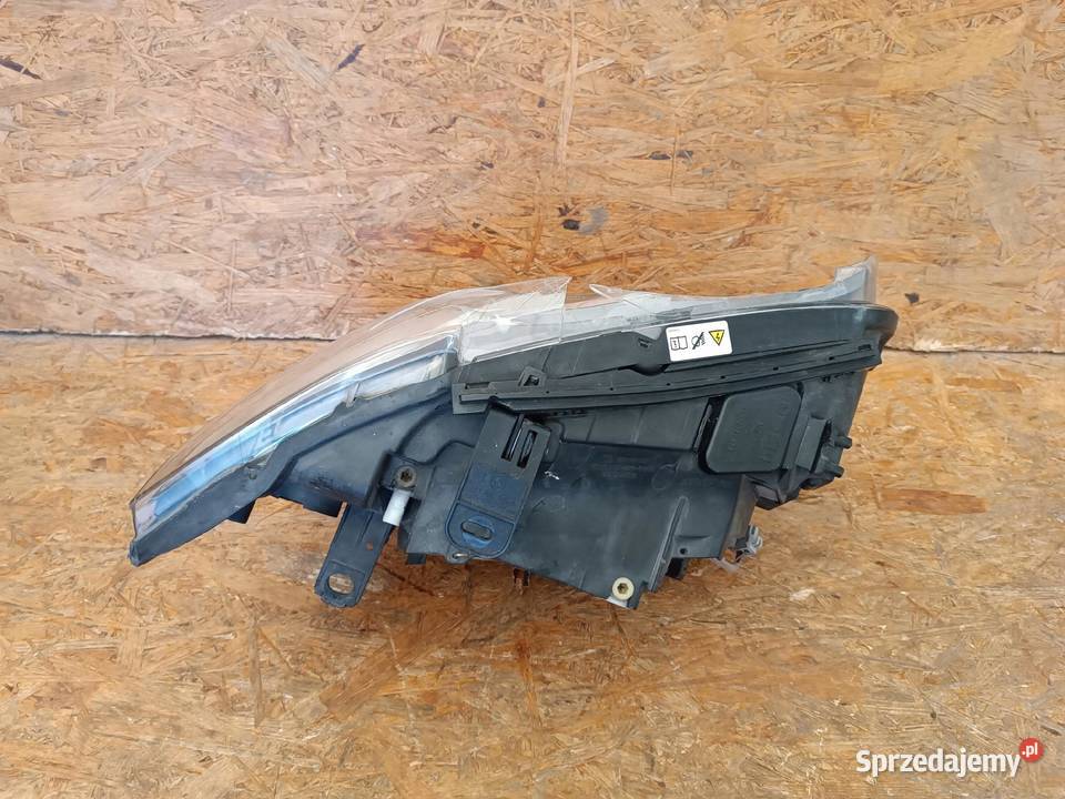 LAMPA LEWY PRZÓD REFLEKTOR EU XENON BMW 1 E81