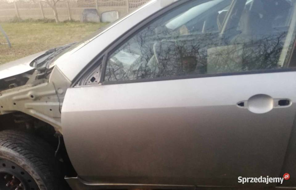 Nissan Primera drzwi przednie lewe lakier kyo g Ostrów Wielkopolski