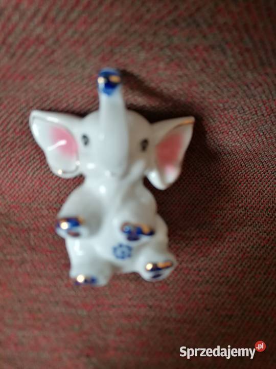 Porcelanowy słonik z złotymi zdobieniamiFigurka Łódź