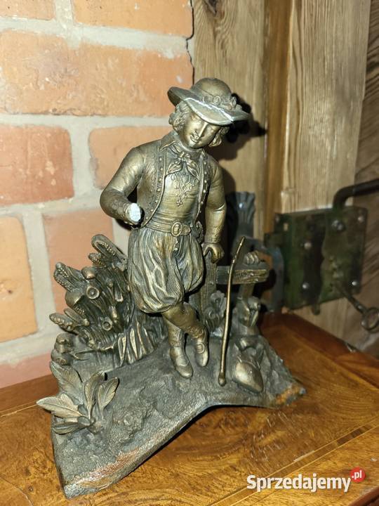 Mosiężna figurka defekt