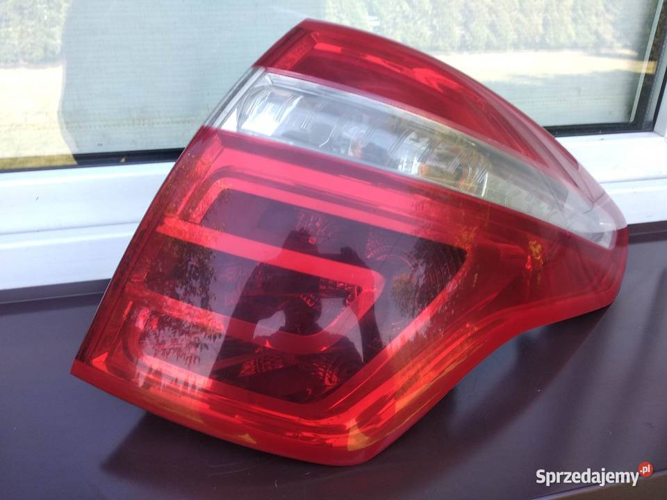 Citroen C4 Picasso I 0610 lampa tył tylna lewa w osobowe łódzkie Sieradz