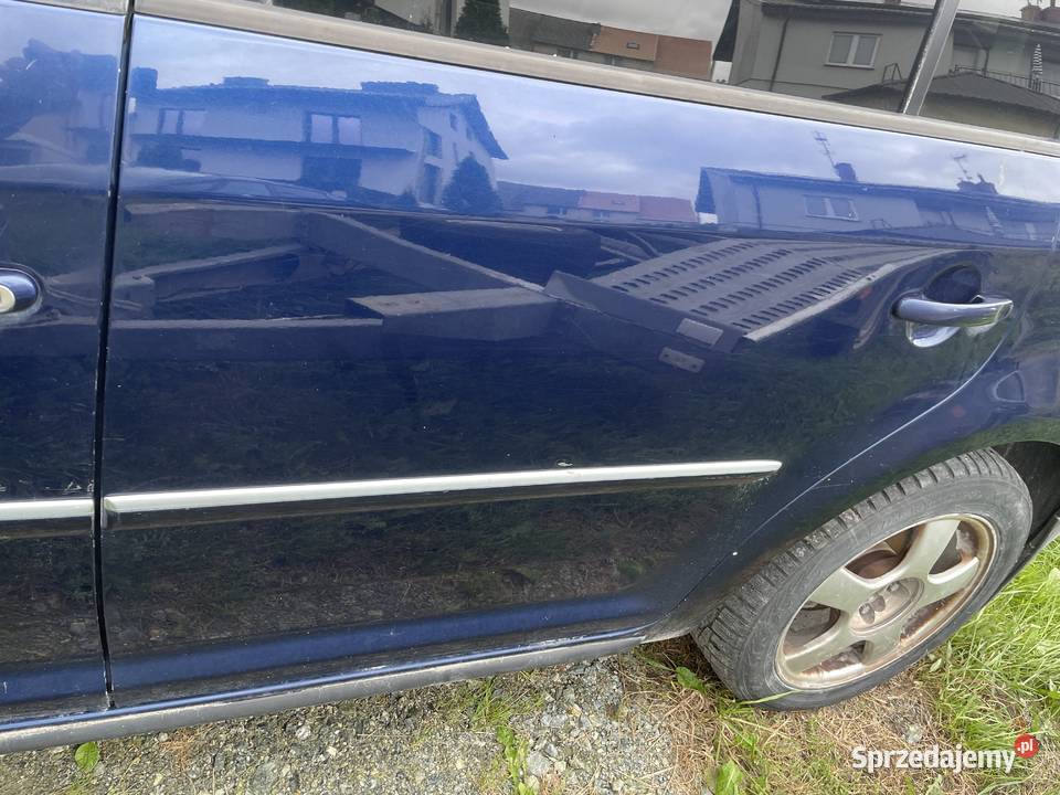 Drzwi LEWY tył VW TOURAN 08r polift LD5Q