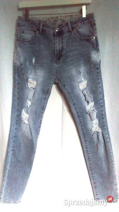 Spodnie damskie JEANS jasny r L Przetarcia gat I niebieski