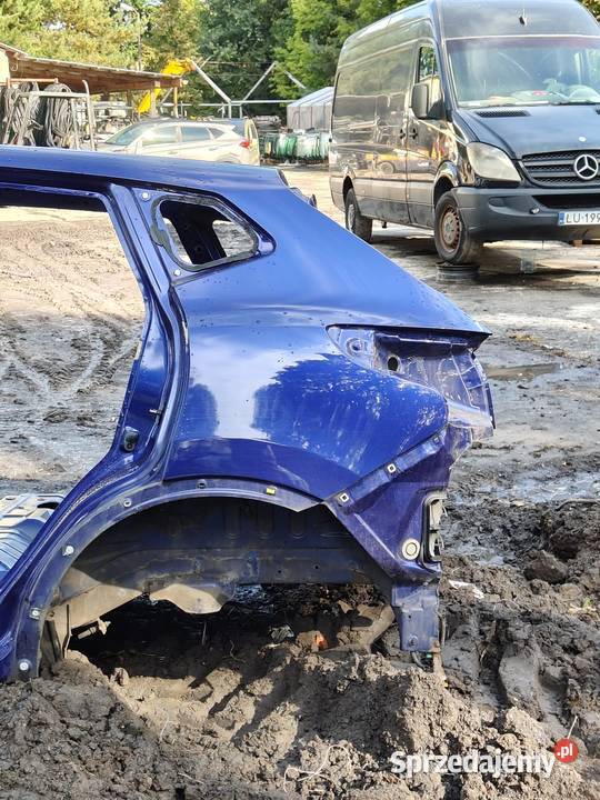 ĆWIARTKA BŁOTNIK LEWY TYLNY TYŁ RBN G NISSAN