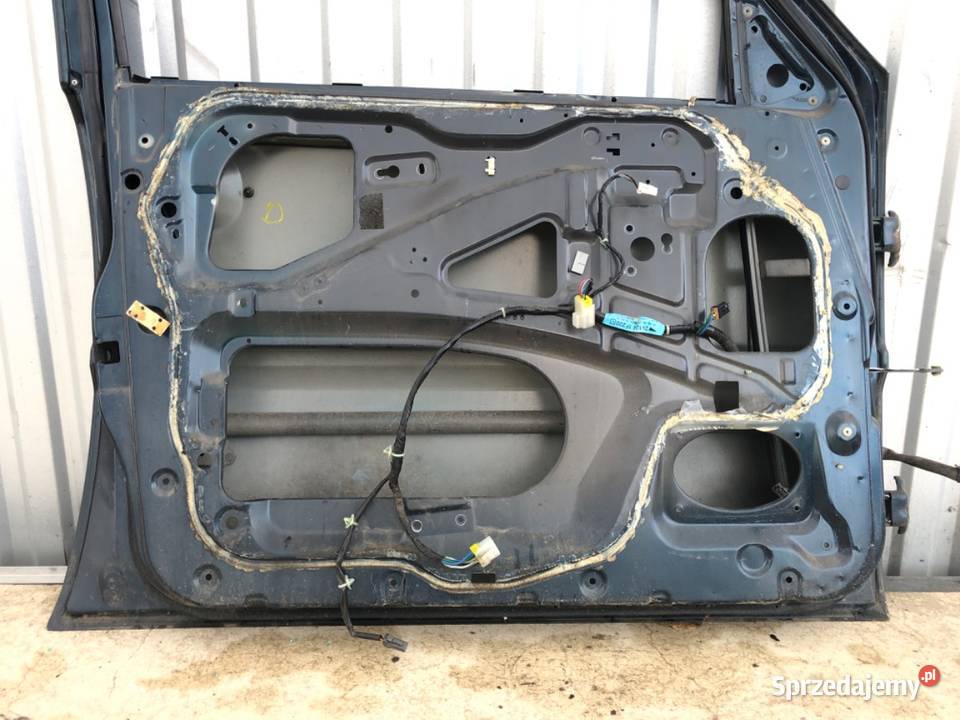 DRZWI LEWY PRZÓD FORD MAVERICK Terenowy 9398 osobowe
