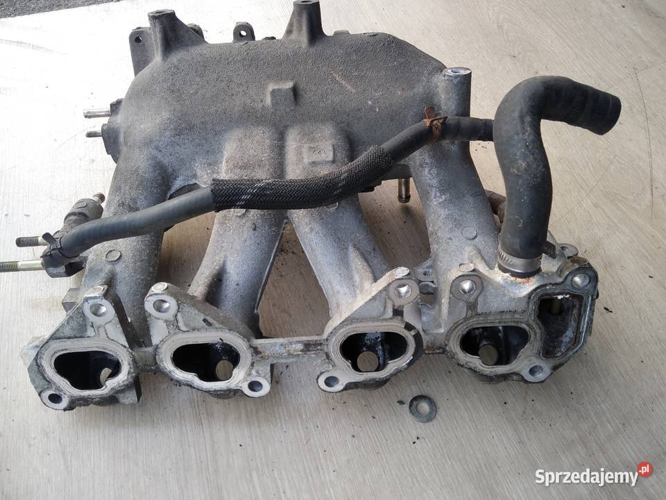 Kolektor ssący UK73CH Nissan Primera lift p11 16 Motoryzacja Krośniewice