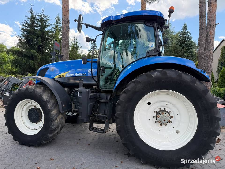Holland T7040 TUZ T6050 NH T7210 Case Puma 165 Zaczep górny Laskowiec