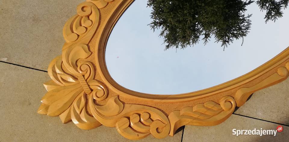 Lustro owalne w drewnianej rzeźbionej ramie
