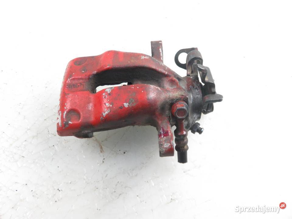 ZACISK PRAWY TYŁ OPEL ASTRA III H