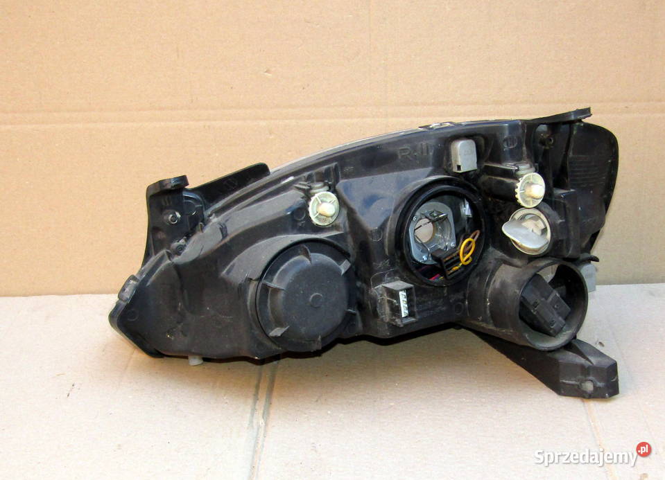 LAMPA PRZEDNIA PRAWA OPEL CORSA C206065 Mysłaków