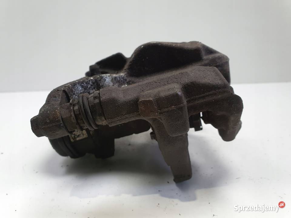 Toyota Corolla XII E21 TYLNY ZACISK HAMULCOWY Rudka