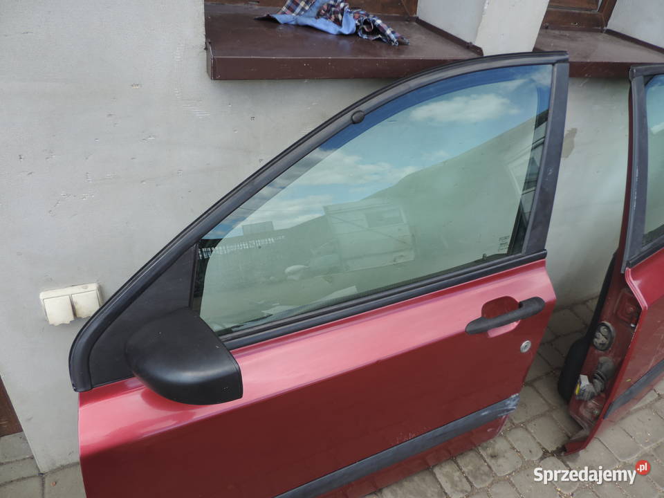 DRZWI LEWY PRZÓD FIAT STILO 1 5D HB KOLOR 132F Części samochodowe Nowy Sącz