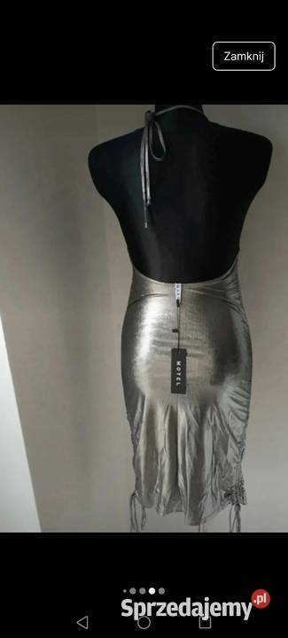 Elegancka sukienka srebna wyeksponowane plecy Krosno