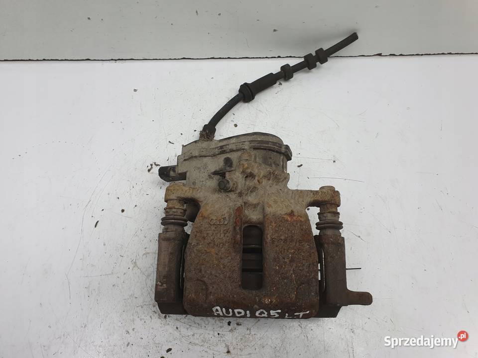 Audi Q5 TYLNY ZACISK HAMULCOWY prawy tył Rudka