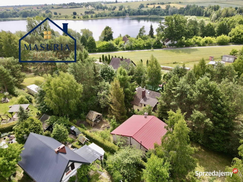 Dom rekreacyjny jeziorem z pomostem 64m2