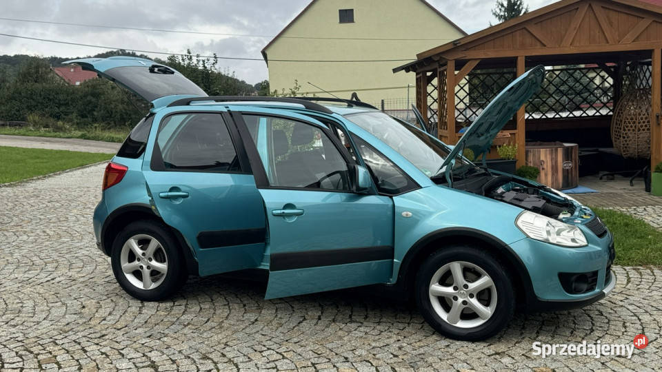 Suzuki SX4 16 Benz 107 z Niemiec CROSS Samochody osobowe Strzegom