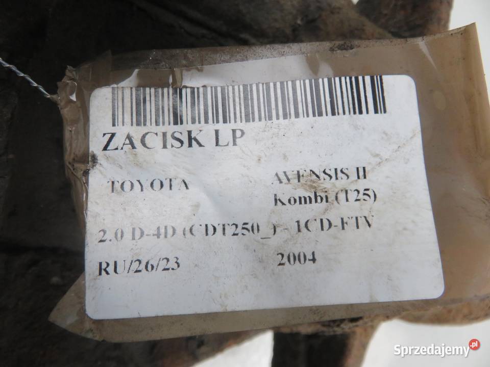 ZACISK LEWY PRZÓD TOYOTA AVENSIS II 20 D4D
