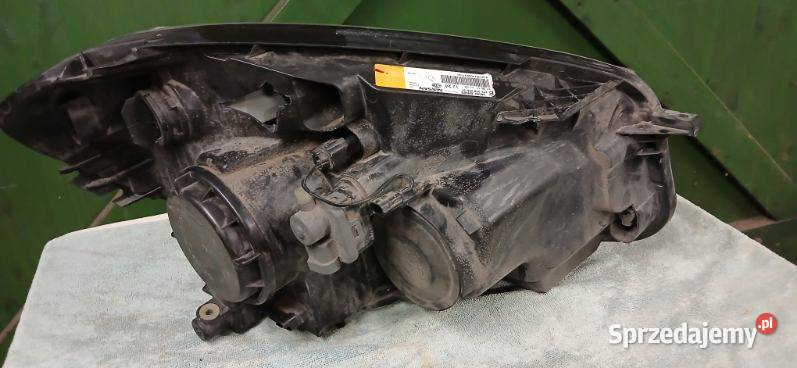 Lampa przód PRAWA LEWA NISSAN QASHQAI J10 LIFT osobowe Oświetlenie Mława