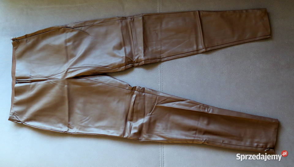 Piękne nowe legginsy z eko skóry r 38 M Bez wzoru Komorniki
