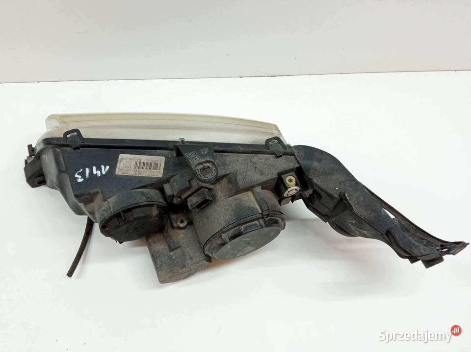 LAMPA PRZÓD PRAWA EU 89006242 Saab 95 I 19972009 Lampy przednie