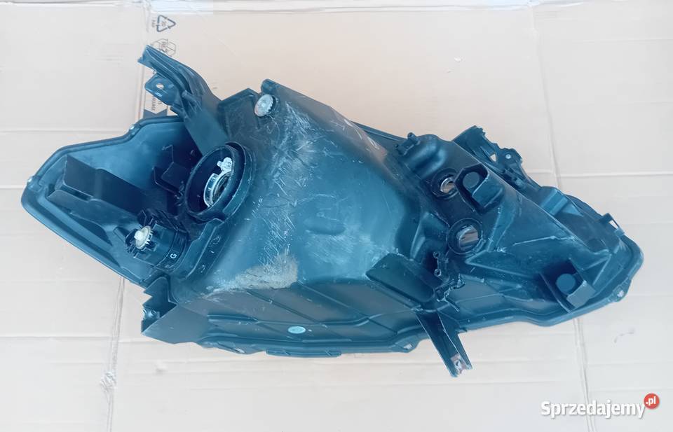 Suzuki SX4 Cross reflektor lampe lewy przód osobowe Lampy przednie Przeźmierowo