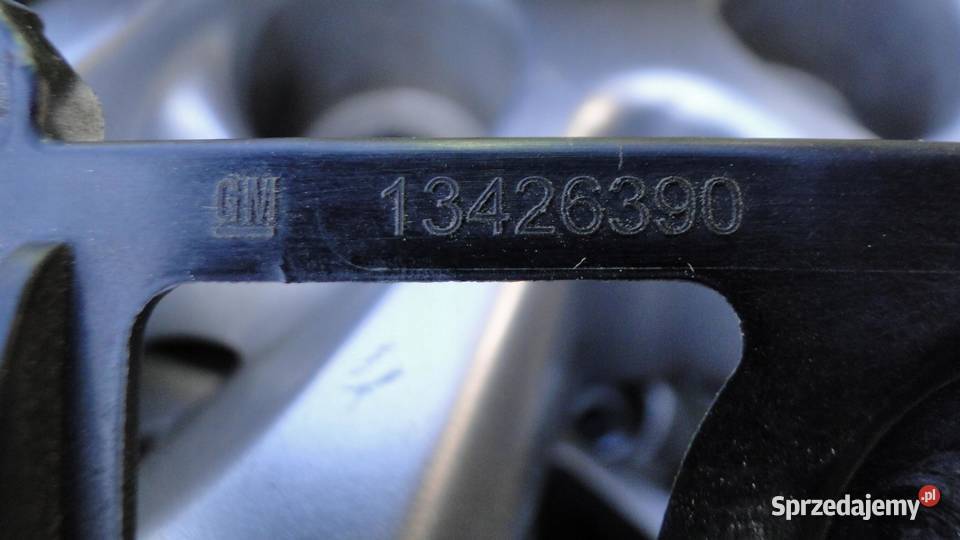 Astra K V 5 Ślizg mocowanie prawy tył 13426390