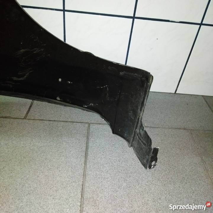 BŁOTNIK PRZEDNI LEWY Nubira 2 Piła