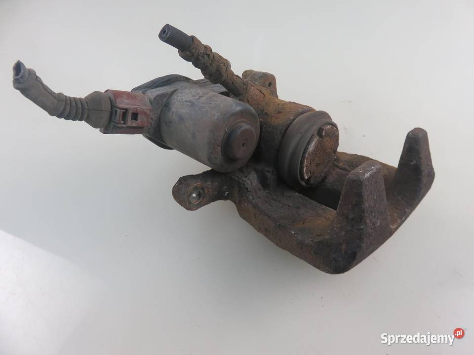 ZACISK LEWY TYŁ AUDI A4 B8 18 TFSI