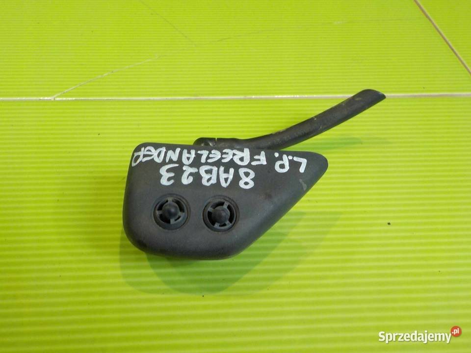 FREELANDER II 07r spryskiwacz lampy lewy przod Spryskiwacze reflektorów Suków