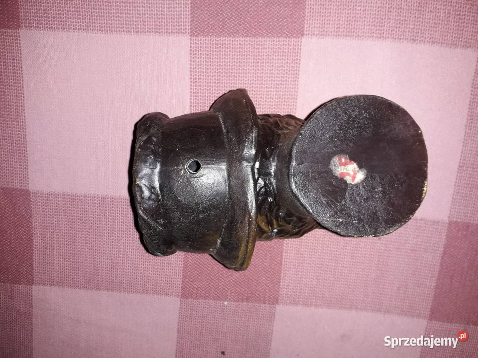 Figurka wędkarza drewniana brązowy