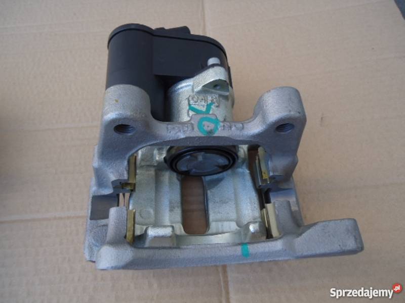 VW PASSAT B6 SILNICZEK ZACISK HAMULCOWY JARZMO