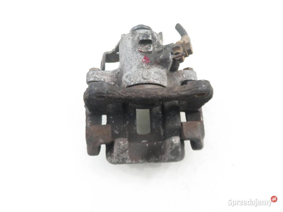 ZACISK LEWY TYŁ AUDI A4 B7 20 TDI Zaciski i jarzma