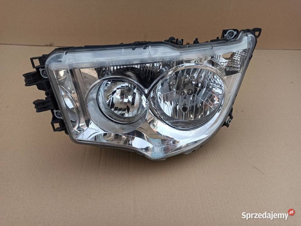 MERCEDES AROCS ANTOS REFLEKTOR LEWY LAMPA LEWA Bieleń