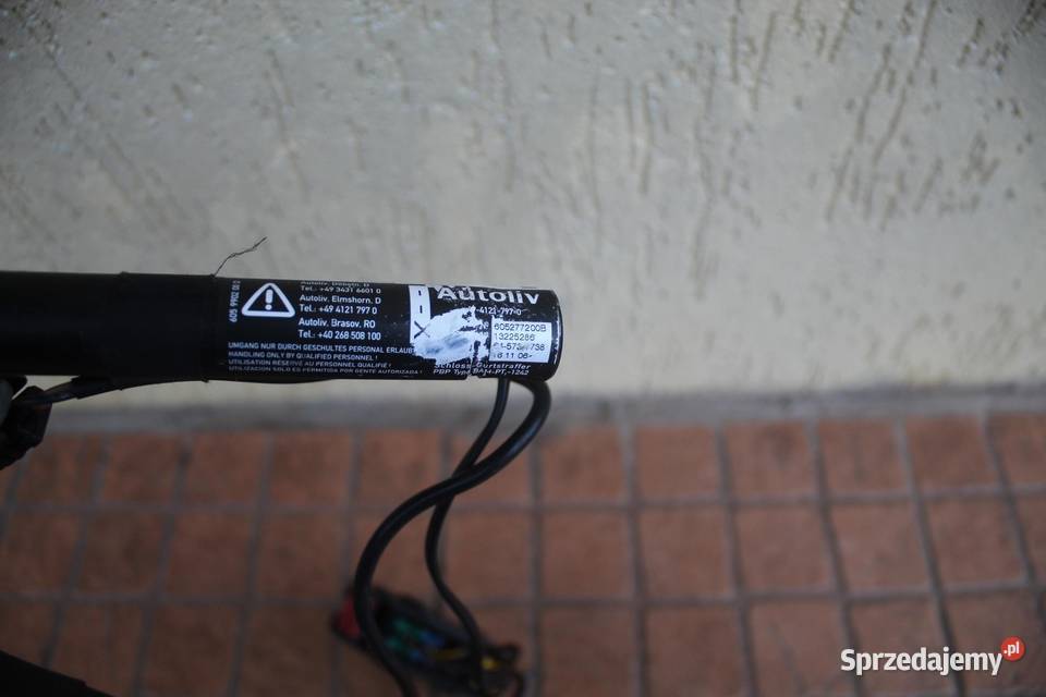 ZAPINKA PASA LEWY PRZÓD OPEL CORSA D 13225286