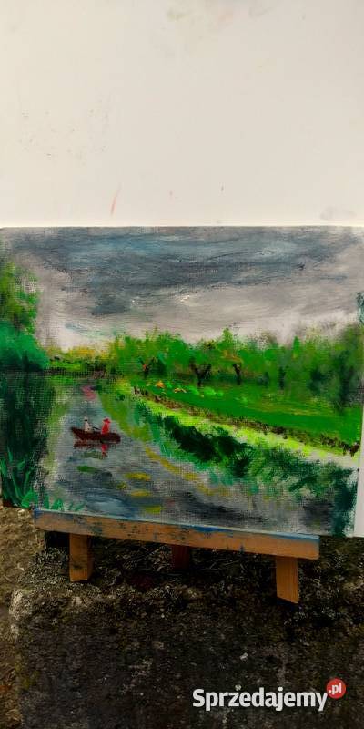 pejzaż z łódką na wodzie Olsztyn