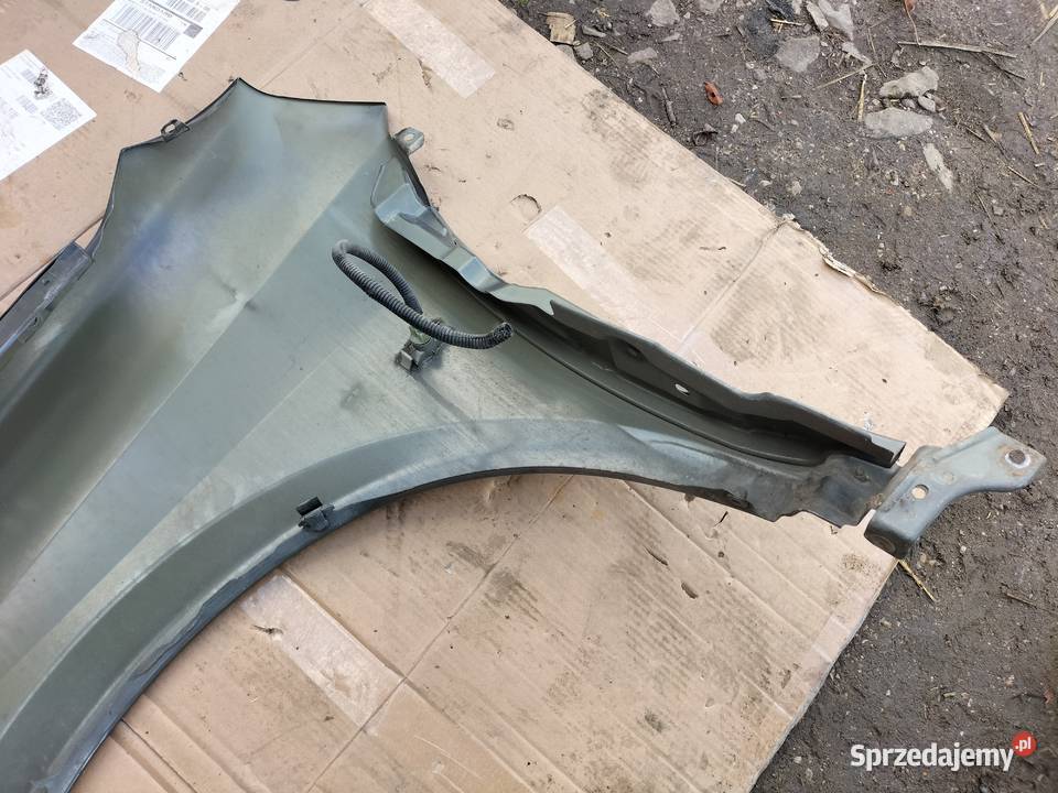 NISSAN PRIMERA P12 BŁOTNIK PRAWY PRZÓD