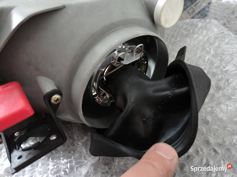 Reflektor lewy Fiat Uno nowy oryginalny Molna