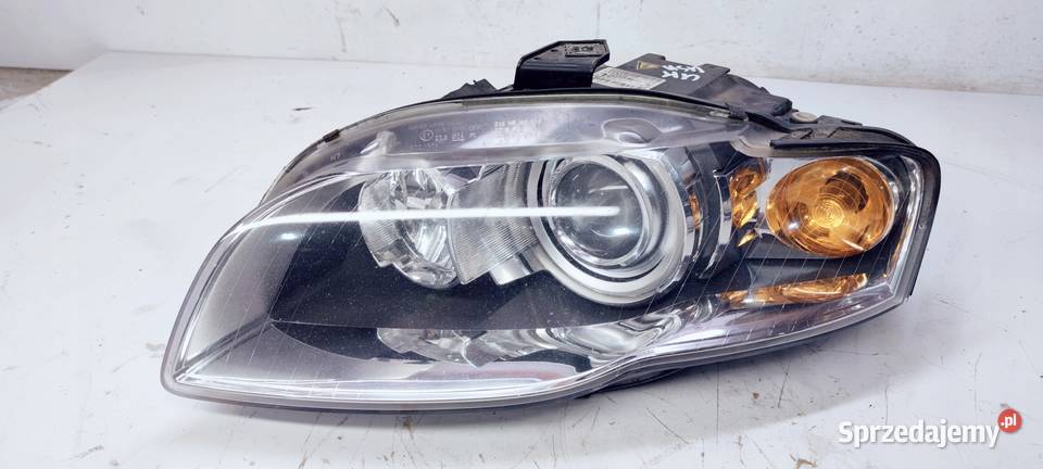 REFLEKTOR LEWY AUDI A4 B7 XENON 8E0941003AN UK osobowe Lampy przednie śląskie Przystajń