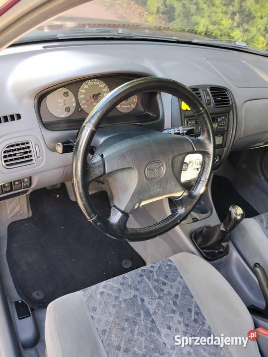 Mazda 323F okazja 1500 Golf colt BMW opel a3 a4 elektryczne lusterka Poznań