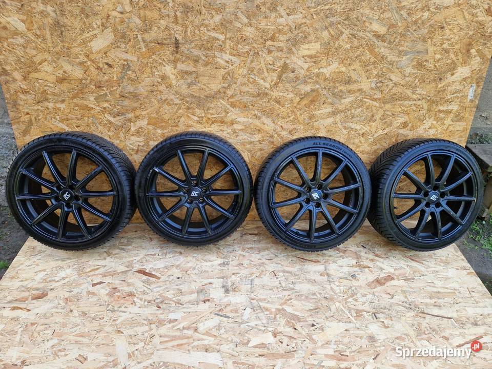 VW FELGI ALUMINIOWE ET39 571mm 5x100 7Jx18 OPONY Słowikowo