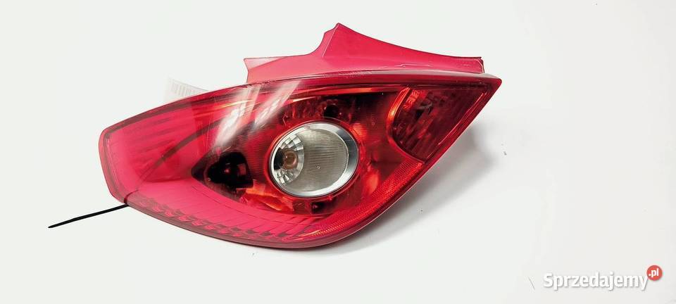 LAMPA LEWA TYŁ OPEL CORSA D 13186350 Pozostałe Lipno