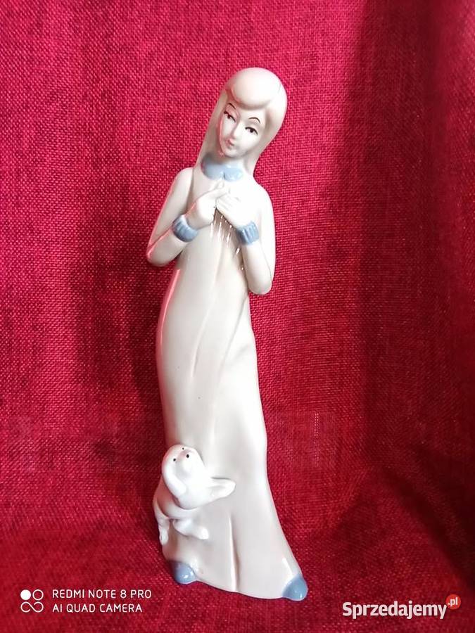 Figurka dziewczynki z pieskiem
Śliczna i Gdańsk